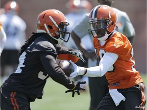 Cleveland Browns RB Isaiah Crowell, shown at practice with Robert Griffin III, has apologized for posting a drawing on Instagram depicting a police officer getting his throat slashed.