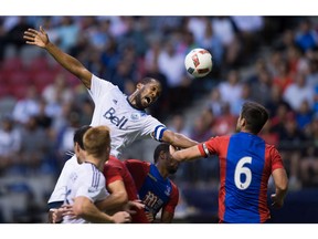 Vancouver Whitecaps' Kendall Waston heads the ball toward the net Tuesday versus Crystal Palace'.