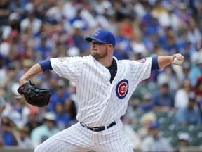 Chicago Cubs starting pitcher Jon Lester delivers during the first inning of a baseball game against the Seattle Mariners Friday, July 29, 2016, in Chicago.