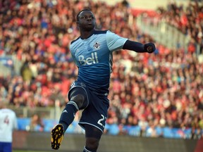 The Vancouver Whitecaps midfielder Kekuta Manneh (23) celebrates after scoring against Toronto FC at BMO Field. Vancouver won 4-3. Mandatory Credit: Dan Hamilton-USA TODAY Sports ORG XMIT: USATSI-263320