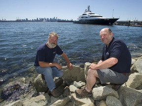Wes Roots (left) and Jay Straith are with Canadian Artificial Reef Consulting, a group that specializes in sinking ships for artificial reefs around the world.