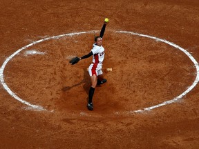 Lauren Bay Regula of Canada delivers a pitch to the plate against Australia during the women's semifinal at the 2008 Summer Olympics in Beijing, China.