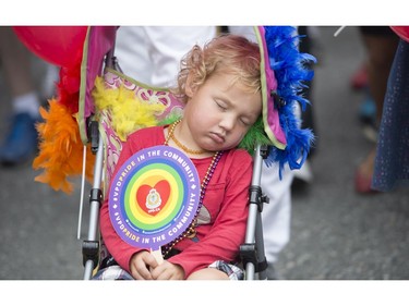 Prime Minister Justin Trudeau's son Hadrien sleeps as the family take part in the Pride Parade in downtown Vancouver, B.C., Sunday, July, 31, 2016.