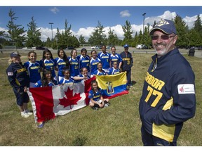 Coach Dwayne Mitchell and his wife Tracey worked hard to bring the Ecuador national women's softball team to Surrey's Softball city.