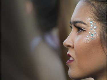 A woman listens as Gallant performs at FVDED in the Park.