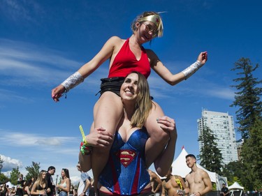 People in costume dance at the FVDED in the Park.