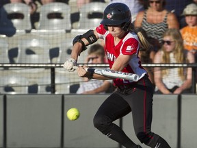 Canada's Larissa Franklin hits against Italy in a game at the WBSC XV women's World Softball Championships at Softball City on Thursday. Team Canada beat Italy, China, Mexico and the Netherlands to make it to the semifinals. The win almost didn't happen after Franklin was accidentally left off the roster against Mexico, forcing the team to shuffle its lineup at the last minute.