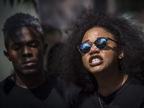 Rodney Diverlus, left, and Alexandria Williams of Black Lives Matter speak during a news conference in Toronto on July 7. The group postponed Toronto's Gay Pride parade in protest. Tyler Anderson/National Post files