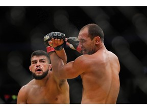 Kelvin Gastelum punches Johny Hendricks during UFC 200 at T-Mobile Arena on July 9, 2016, in Las Vegas.