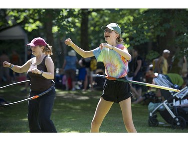 Vancouver   B.C.  July 17, 2016  Grooving to it all-- Thousands took part in the 39th annual Vancouver Folk Festival in Jericho Beach Park in Vancouver on July 17, 2016.  Musicians from around the world performed at the dynamic and colourful festival.  Here what was old, in new again in Hula-Hooping.   Mark van Manen/ PNG Staff photographer   see  Franois Marchand Vancouver Sun/ Province   Entertainment  Features and Web. stories   00044092C [PNG Merlin Archive]