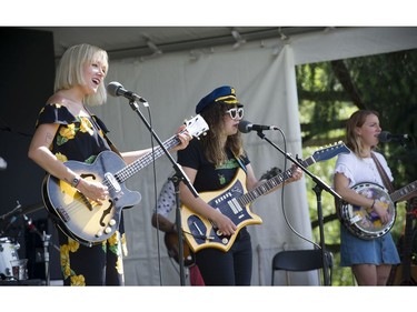 Vancouver   B.C.  July 17, 2016  Grooving to it all-- Thousands took part in the 39th annual Vancouver Folk Festival in Jericho Beach Park in Vancouver on July 17, 2016.  Musicians from around the world performed at the dynamic and colourful festival. Here dancing to the sights and sounds of the festival.  Here Les Hay Babies on stage.   Mark van Manen/ PNG Staff photographer   see  Franois Marchand Vancouver Sun/ Province   Entertainment  Features and Web. stories   00044092C [PNG Merlin Archive]