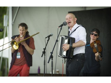 Vancouver   B.C.  July 17, 2016  Grooving to it all-- Thousands took part in the 39th annual Vancouver Folk Festival in Jericho Beach Park in Vancouver on July 17, 2016.  Musicians from around the world performed at the dynamic and colourful festival. Here Geoff Berner thrills his fans.   Mark van Manen/ PNG Staff photographer   see  Franois Marchand Vancouver Sun/ Province   Entertainment  Features and Web. stories   00044092C [PNG Merlin Archive]