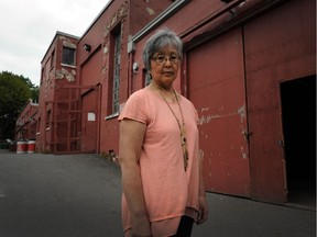 Judy Hanazawa, whose parents were among some 22,000 Japanese-Canadian detainees, stands outside the PNE's livestock buildings, where internees were held for several months at a time.