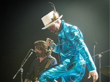 The Tragically Hip's Paul Langlois and Gord Downie on stage on Sunday night at Rogers Arena.