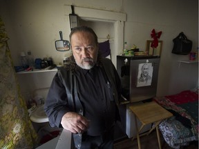 Jack Gates shows his eviction papers in his room at the Regent Hotel. He was awarded $1,675 by small-claims court after complaining about the lack of heat and hot water in his room. The owning company, Triville Enterprises, whose director is Parkash Sahota, has yet to pay.