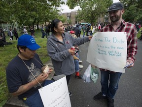 Barbara Nepinak, centre, with Derek Lacquette, left, and Derek Rolph at a housing protest at Oppenheimer Park in Vancouver. Too many Canadians are facing a housing crisis, including, of course, in Metro Vancouver, says Clark Somerville, president of the Federation of Canadian Municipalities.