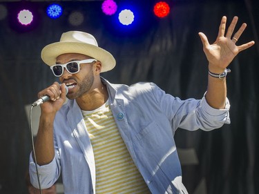 Khari Wendell McClellan and the Unsung Heroes perform as thousands enjoy the music during Jazz Weekend at David Lam Park in Vancouver.