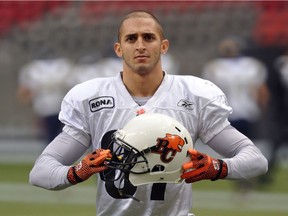 Lions receiver Marco Iannuzzi wore a special helmet in 2012 because of a concussion.