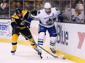 Loui Eriksson, left, was snapped up by the Vancouver Canucks on Day 1 of free agency. Dan Hamhuis left Vancouver for Dallas on the same day.