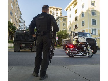 VANCOUVER July 30 2016.  A barricade on Beach ave uses city of Vancouver dump trucks and VPD ERT member provide security for the fireworks display at the Honda celebration of light at English Bay, Vancouver, July 30 2016.  ( Gerry Kahrmann  /  PNG staff photo)  ( Prov / Sun News) 00044364A  [PNG Merlin Archive]