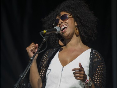 Krystle Dos Santos sings at the Shorefest Sunset Beach stage  prior to the fireworks display from team USA Disney at the Honda Celebration of Light.