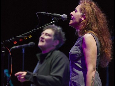 Neko Case (R) , kd lang (L) and Laura Veirs (not in photo) perform in concert at the Queen Elizabeth Theatre in Vancouver.