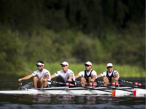 Members of the Canadian Olympic mens rowing quad, left to right, Pascal Lussier, Will Dean, Rob Gibson and Julien Bahain scull during a morning training session on Elk Lake in Victoria in June.