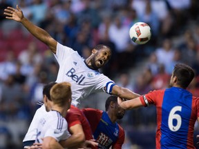 The Whitecaps' Kendall Waston scores against Crystal Palace.