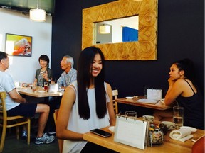 Diners enjoy Masayoshi sushi restaurant on Fraser Street in east Vancouver.