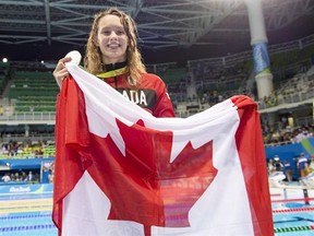 Canada&#039;s Penny Oleksiak shows off her silver medal from women&#039;s 100-metre butterfly at the 2016 Summer Olympics on Sunday, August 7, 2016 in Rio de Janeiro, Brazil. Penny Oleksiak has a shot at breaking the record for most medals by a Canadian swimmer at a single Games on Thursday night when she swims in the 100-metre freestyle final.THE CANADIAN PRESS/Frank Gunn