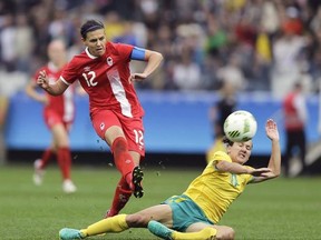 Canada&#039;s Christine Sinclair, left, scores her team&#039;s 2nd goal, during the 2016 Summer Olympics football match between Canada and Australia, at the Arena Corinthians, in Sao Paulo, Brazil, Wednesday, Aug. 3, 2016. Canada&#039;s Christine Sinclair, who plays for the Portland Thorns, has been named the National Women&#039;s Soccer League Player of the Olympics. THE CANADIAN PRESS/AP, Nelson Antoine