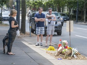 Flowers placed at the fatal traffic accident at a Vancouver intersection.