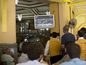 People watch the final vote of Brazil&#039;s Senate on whether to permanently remove suspended President Dilma Rousseff, at a restaurant in Rio de Janeiro, Brazil, Wednesday, Aug. 31, 2016. Brazil&#039;s Senate on Wednesday voted to permanently remove Rousseff from office, 61-20, more than the 54 votes they needed. (AP Photo/Silvia Izquierdo)