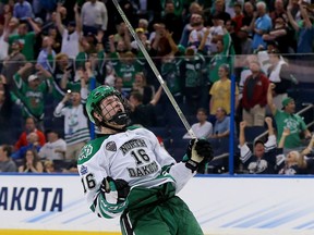 Brock Boeser celebrates scoring against the Denver Pioneers during semifinals of the 2016 NCAA Division I Men's Hockey Championships.