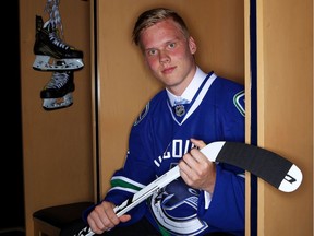 Olli Juolevi poses for a portrait after being selected fifth overall by the Vancouver Canucks in round one during the 2016 NHL Draft on June 24, 2016 in Buffalo, New York.