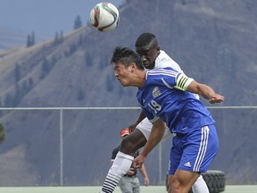 Bryan Fong (front) of UBC battles Olamide Ajibike in the the air during Canada West men's soccer opener for both teams Saturday in Kamloops. (TRU athletics)