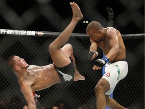Anthony Pettis, left, fights Edson Barboza during a lightweight mixed martial arts bout at UFC 197, Saturday, April 23, 2016, in Las Vegas.
