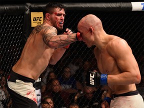 Chris Camozzi punches Vitor Miranda of Brazil in their middleweight bout during the UFC Fight Night event inside the Mandalay Bay Events Center on May 29, 2016 in Las Vegas, Nevada.