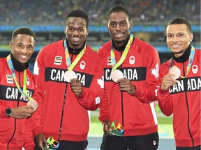 Canada's Akeem Haynes, left to right, Aaron Brown, Brendon Rodney and Andre De Grasse show off their 4x100-metre bronze medals at the 2016 Summer Olympics in Rio de Janeiro, Brazil on Saturday, August 20, 2016.