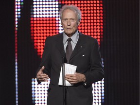 Clint Eastwood presents the hero award at the Guys Choice Awards at Sony Pictures Studios in Culver City, Calif., in june. Eastwood has stopped short of endorsing Donald Trump, but in an interview in Esquire magazine he praised the Republican presidential candidate for being "on to something." In the interview posted online Aug. 3, the actor-director hailed Trump as a foe of political correctness and lamented what he called "the kiss-ass generation." (Chris Pizzello/Invision/AP Files)