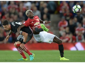 Paul Pogba (right, battling with Southampton's Jose Fonte) is a big addition to United, returning to Manchester after a four-year stint with Juventus.