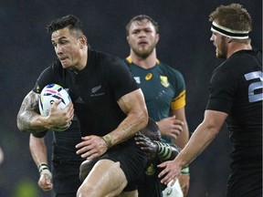 FILE - In this Oct. 24, 2015 file photo, New Zealand's Sonny Bill Williams runs with the ball during the Rugby World Cup semifinal match between New Zealand and South Africa at Twickenham Stadium in London.