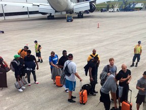 The B.C. Lions' chartered flight from Montreal was delayed for more than 14 hours on Friday.