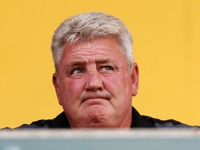 Hull manager Steve Bruce looks on during their pre-season friendly against Mansfield Town at the One Call Stadium in Mansfield, England, on July 19. Just three weeks before the start of the season, Bruce quit in frustration because Hull hasn't brought in a single new first-team player since gaining promotion. — The Associated Press files