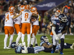 B,C. Lions running back Anthony Allen celebrates scoring a touchdown against the Argonauts Wednesday in Toronto. The Leos won 16-13 on field goal by Richie Leone with no time left on the clock.