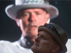 A Tragically Hip fan stands in front of the big screen at a live viewing party in Vancouver for the band’s final show. Singer Gord Downie was diagnosed with terminal brain cancer earlier this year.