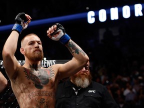 Conor McGregor celebrates his win over Nate Diaz at UFC 202 Saturday in Las Vegas.