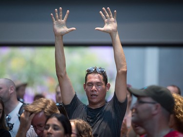 Steven Seegerts reacts at the end of a song during a viewing party for the final stop in Kingston, Ont., of a 10-city national concert tour by The Tragically Hip, in Vancouver, B.C., on Saturday August 20, 2016. Lead singer Gord Downie announced earlier this year that he was diagnosed with an incurable form of brain cancer. THE CANADIAN PRESS/Darryl Dyck ORG XMIT: VCRD117