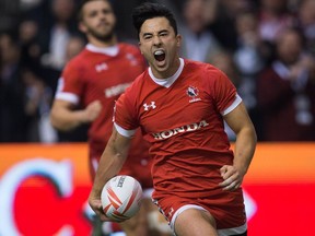 Canada's Nathan Hirayama celebrates a try against France during World Rugby Sevens Series' Canada Sevens Bowl final action, in Vancouver, B.C., on Sunday March 13, 2016.