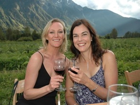 Australian food and wine scribe Sarah Berry, left, and Tourism Whistler’s Tania Sear raised a glass to the celebration of local flavours at the largest longtable dinner in B.C. history.